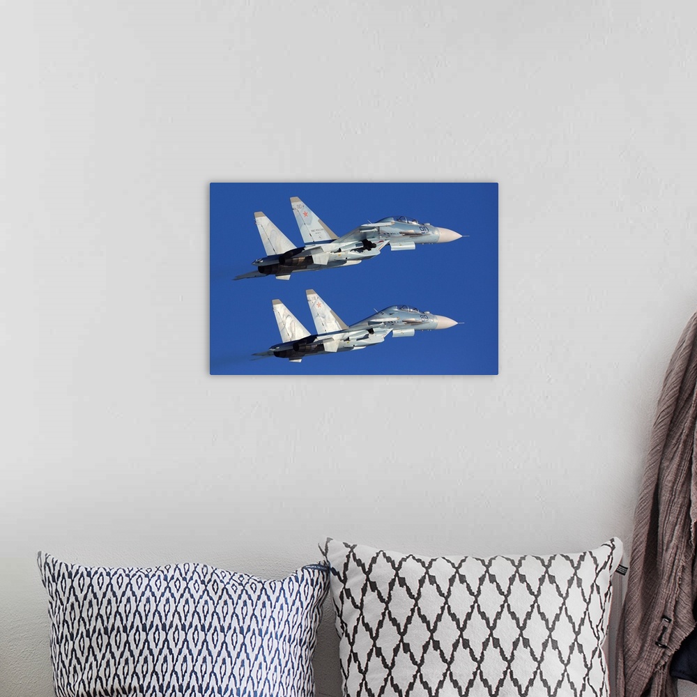 A bohemian room featuring Su-30M2 jet fighters of Russian Air Force taking off, Zhukovsky, Russia.