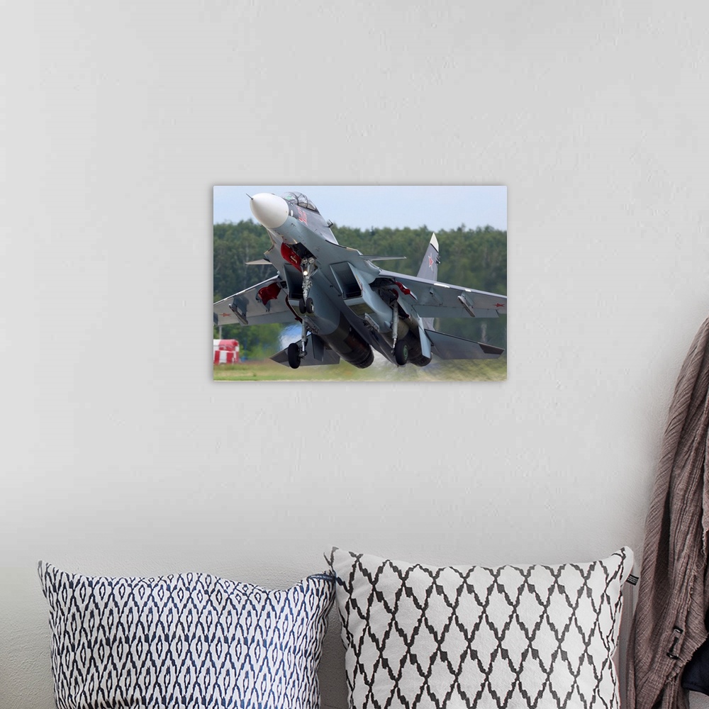 A bohemian room featuring Su-30SM jet fighter of Russian Air Force taking off, Kubinka, Russia.