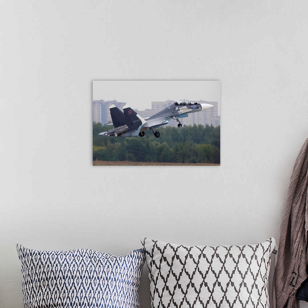 A bohemian room featuring Su-30SM jet fighter of Russian Navy taking off, Zhukovsky, Russia.