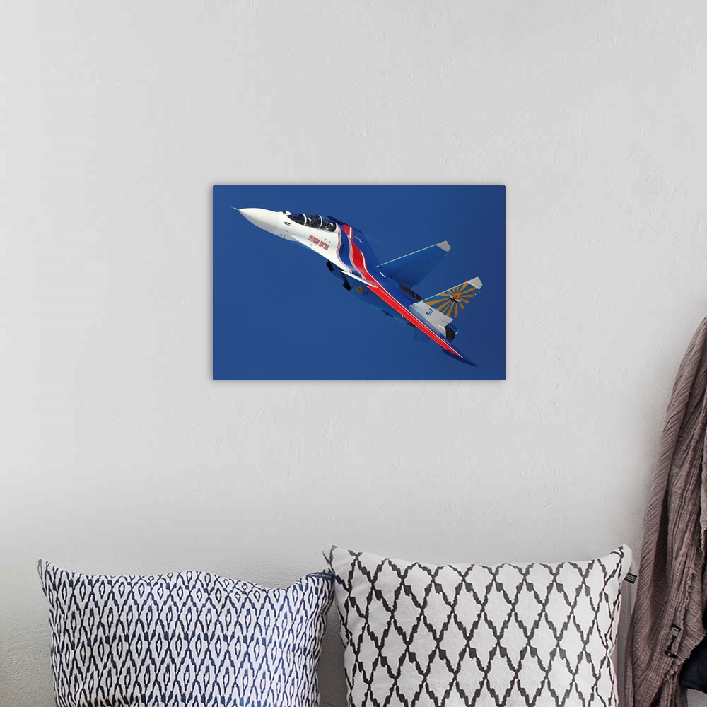 A bohemian room featuring Su-30SM jet fighter of the Russian Knights aerobatic team.