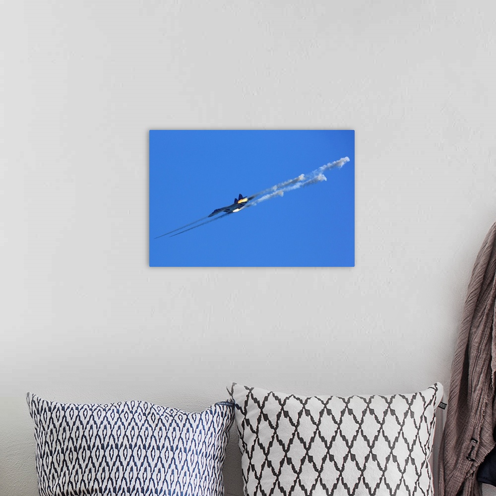 A bohemian room featuring Su-35S jet fighter of Russian Air Force firing unguided missiles.