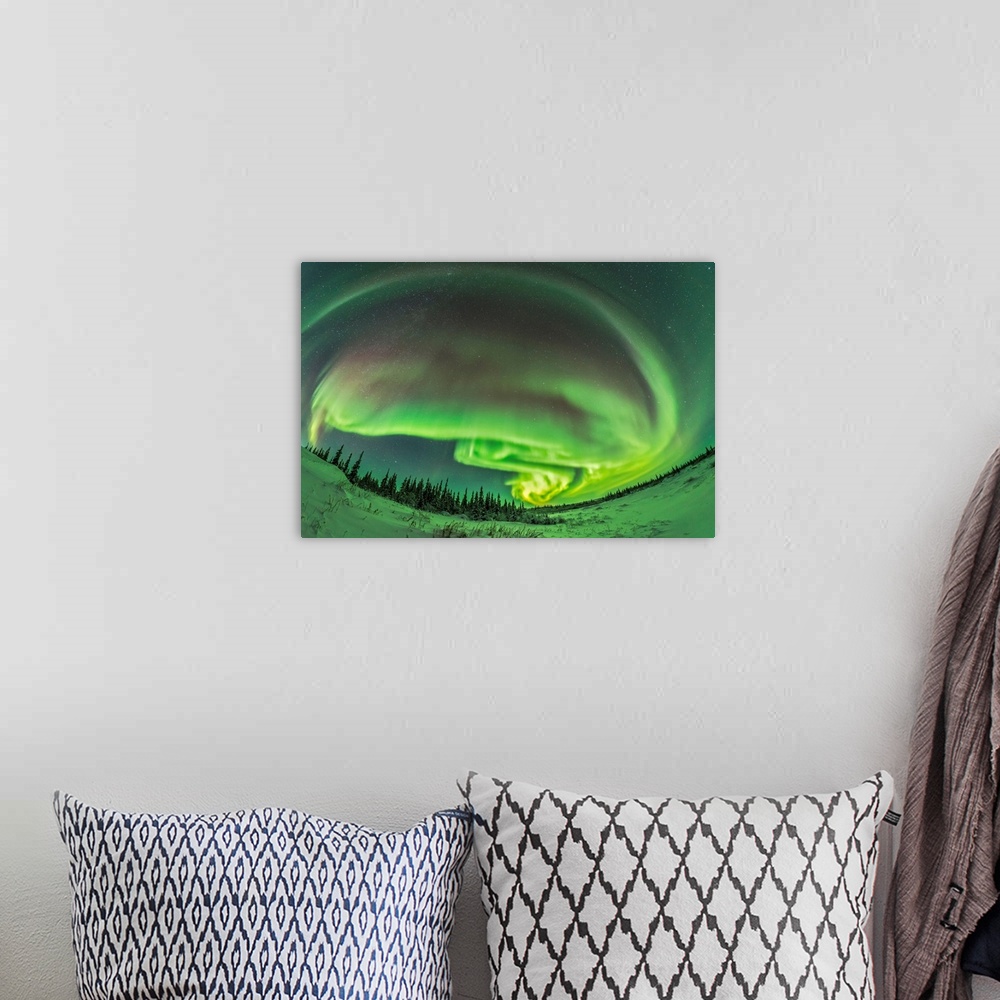 A bohemian room featuring The aurora borealis in a modest display from Churchill, Manitoba.