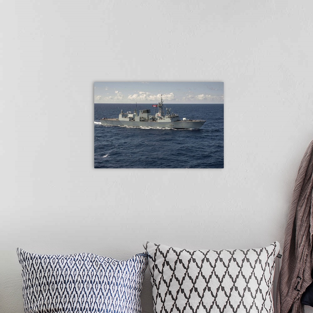 A bohemian room featuring The Canadian frigate HMCS Regina.