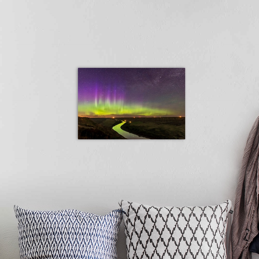 A bohemian room featuring The northern lights dance over the Red Deer River and Badlands of Alberta, Canada.