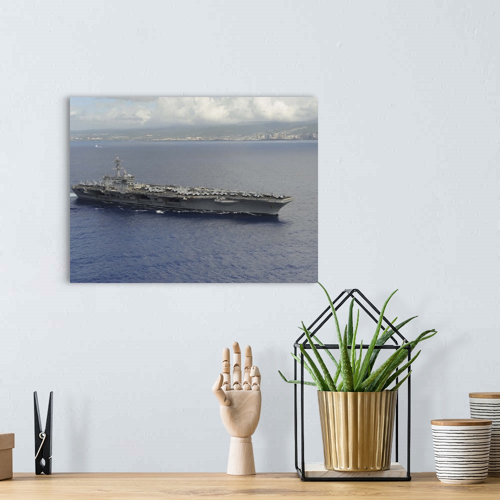 A bohemian room featuring USS Theodore Roosevelt departs from Joint Base Pearl Harbor-Hickam, Hawaii.