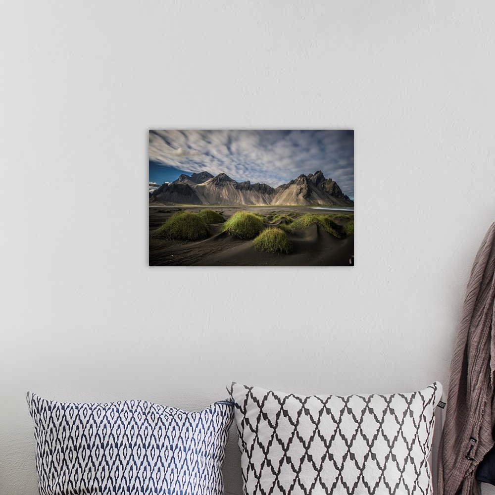A bohemian room featuring Vesturhorn Mountain in Iceland.