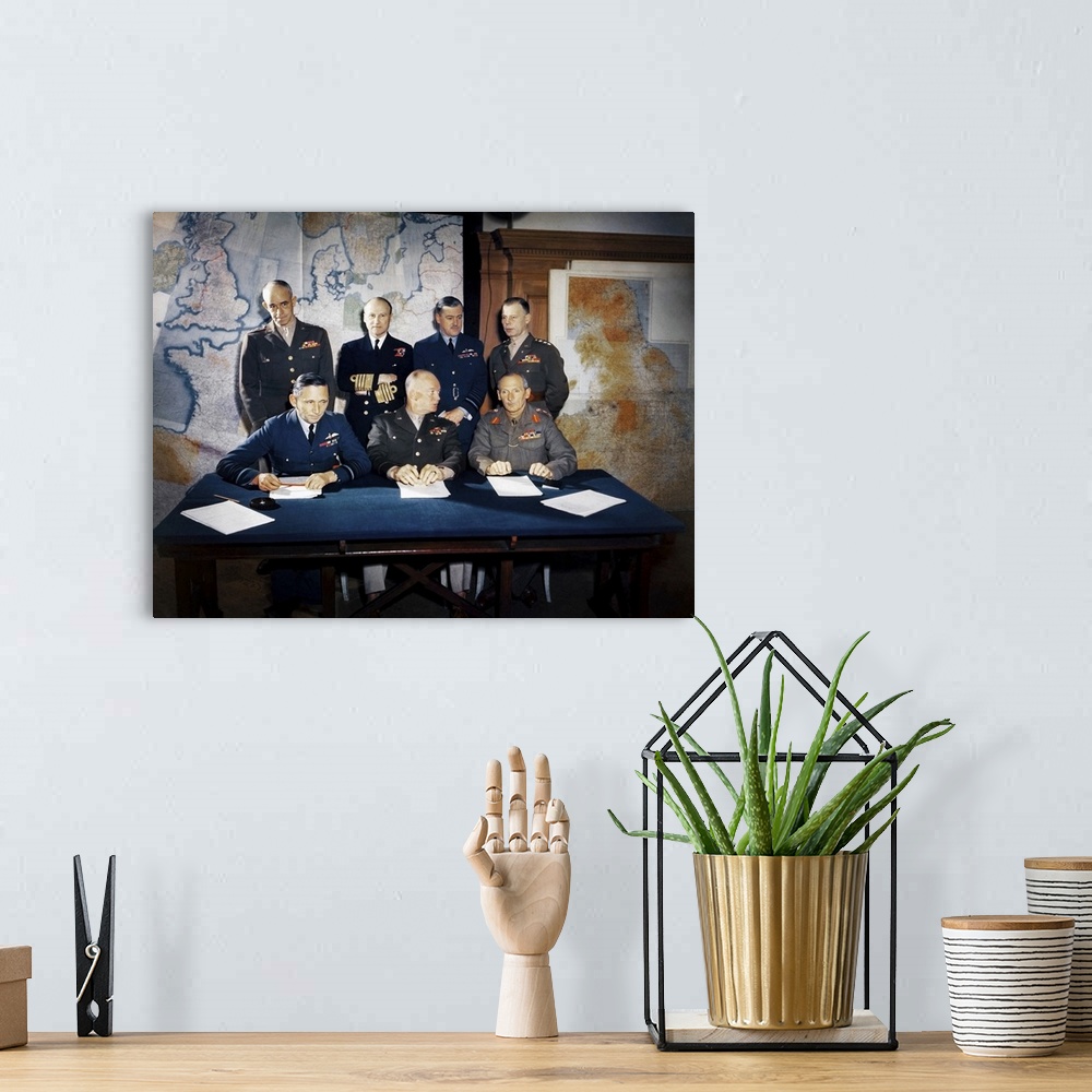 A bohemian room featuring World War II photograph shows the Meeting of the Supreme Command, Allied Expeditionary Force in L...