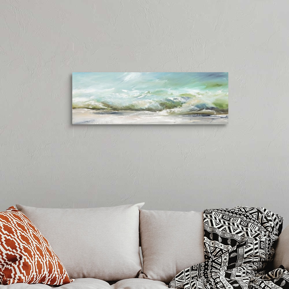 A bohemian room featuring A contemporary panoramic painting of green ocean waves washing onto the sand - a calm image perfe...