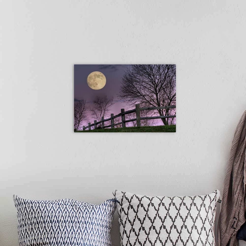 A bohemian room featuring November Moon rising over hill at Inn at Cedar Falls in Hocking Hills