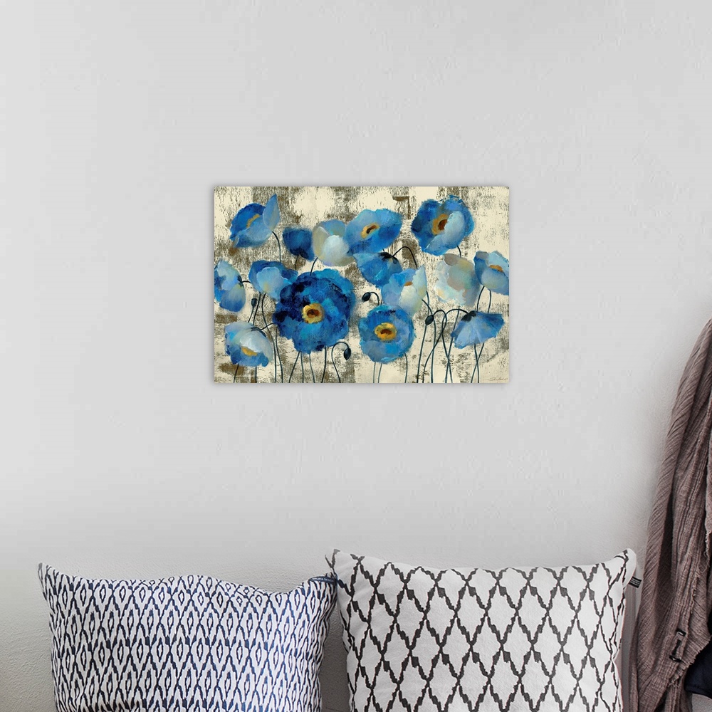 A bohemian room featuring Big contemporary art that illustrates flowers and flower buds against a rough background.
