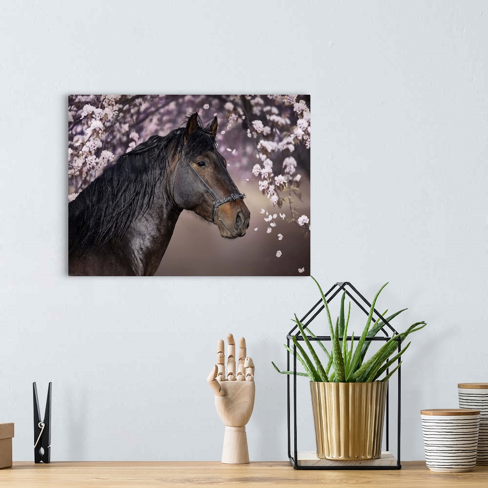 A bohemian room featuring A portrait of a black horse standing under a tree with pink blossoming flowers.