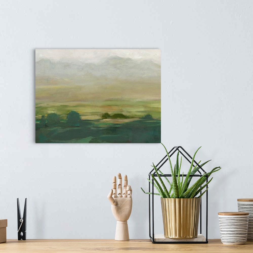 A bohemian room featuring Contemporary landscape painting of a valley in the countryside.