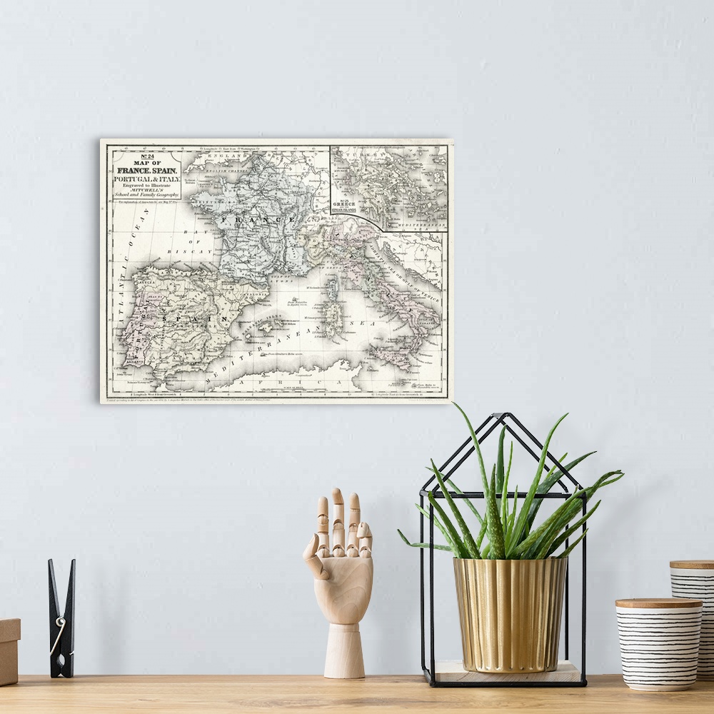 A bohemian room featuring Mitchell's Map of France, Spain and Italy