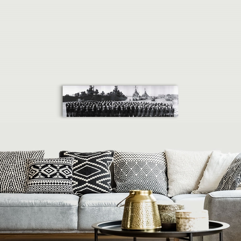 A bohemian room featuring Ships at anchor & USS Claxton crew