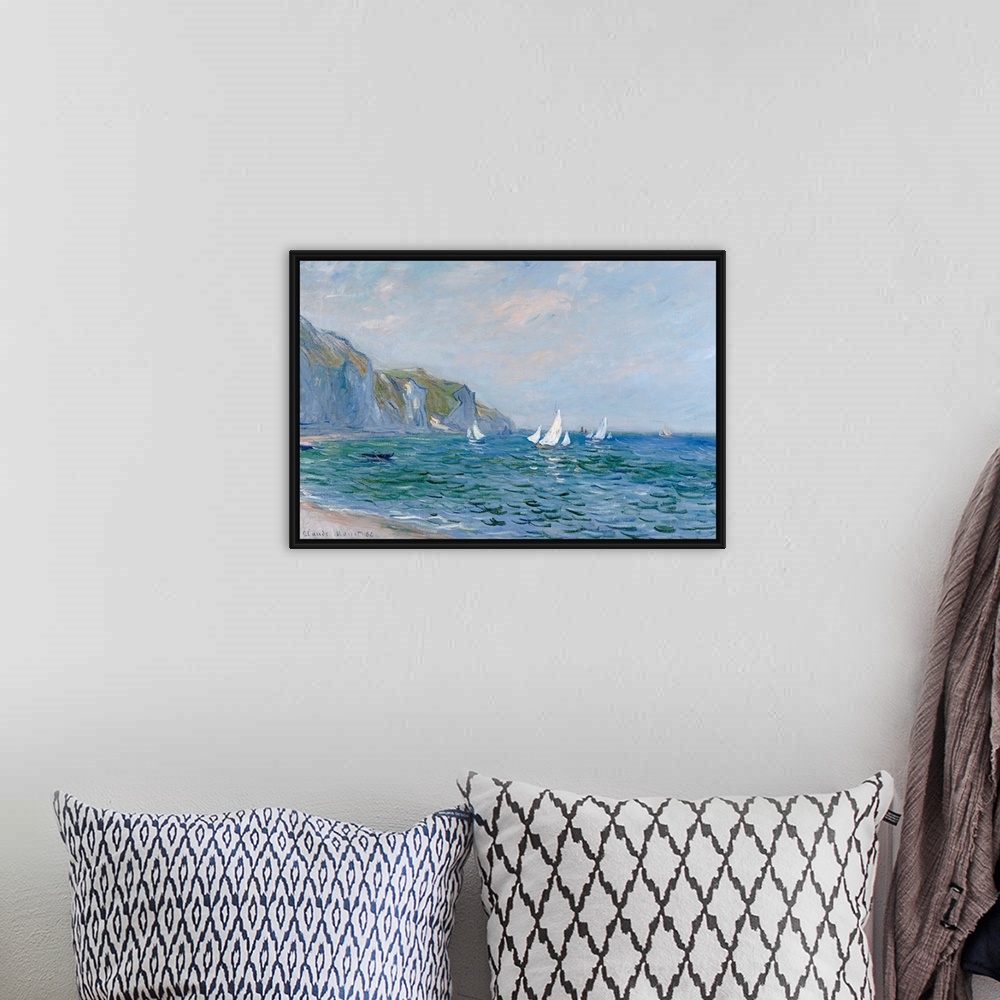 A bohemian room featuring A landscape painting from a classic Impressionist master, this scene shows sail boats on the sea ...