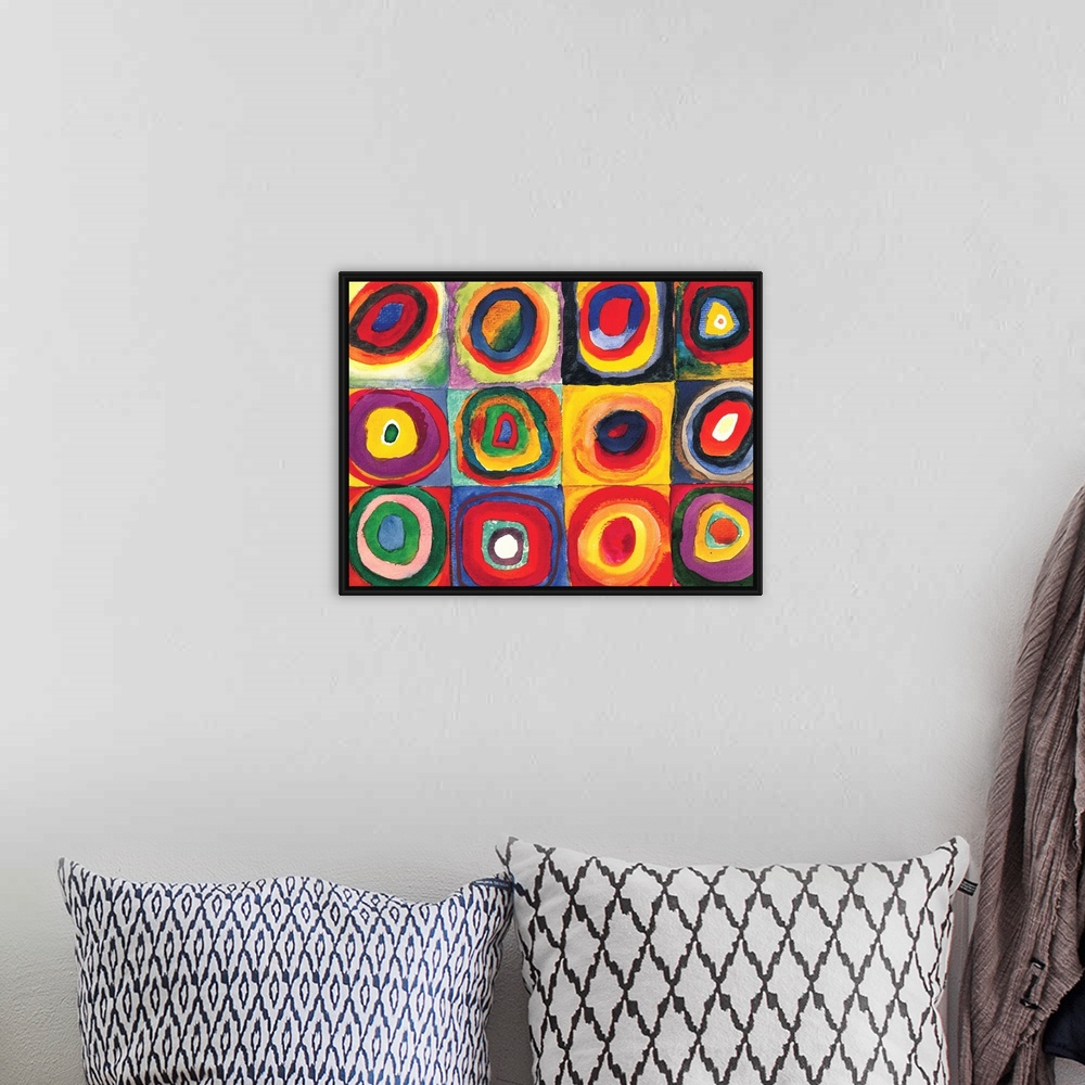A bohemian room featuring A Contemporary painting of colorful rings of circles within squares.