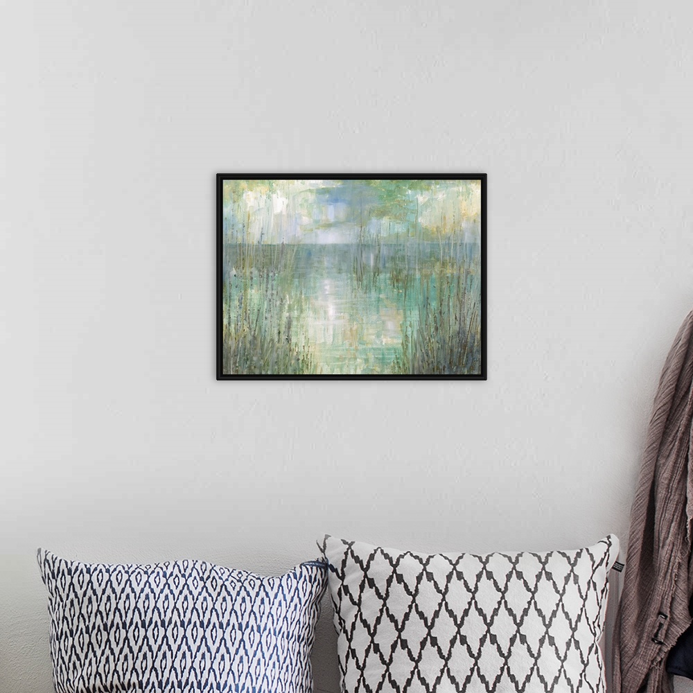 A bohemian room featuring Abstract landscape painting of the ocean behind tall beach grass in pale green, blue, purple, and...