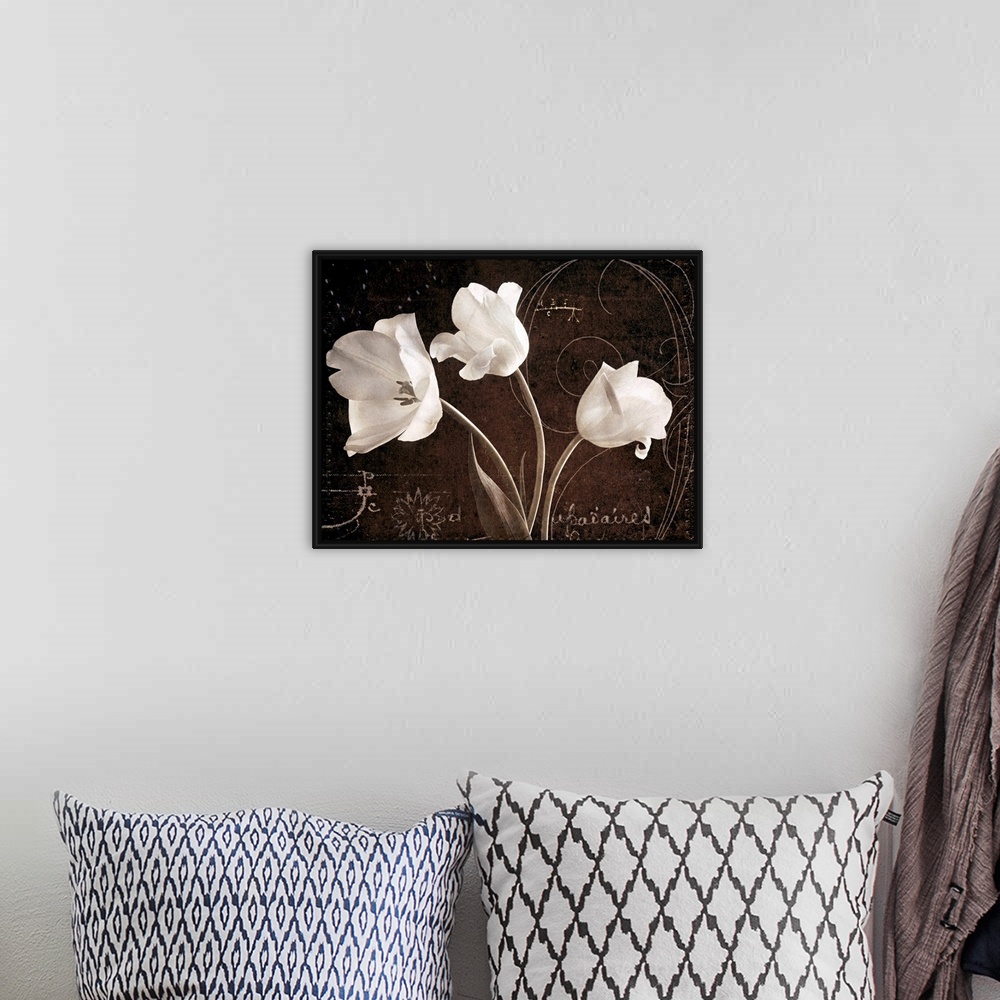 A bohemian room featuring Big canvas of three flowers against a vintage background with decorative markings and writings.