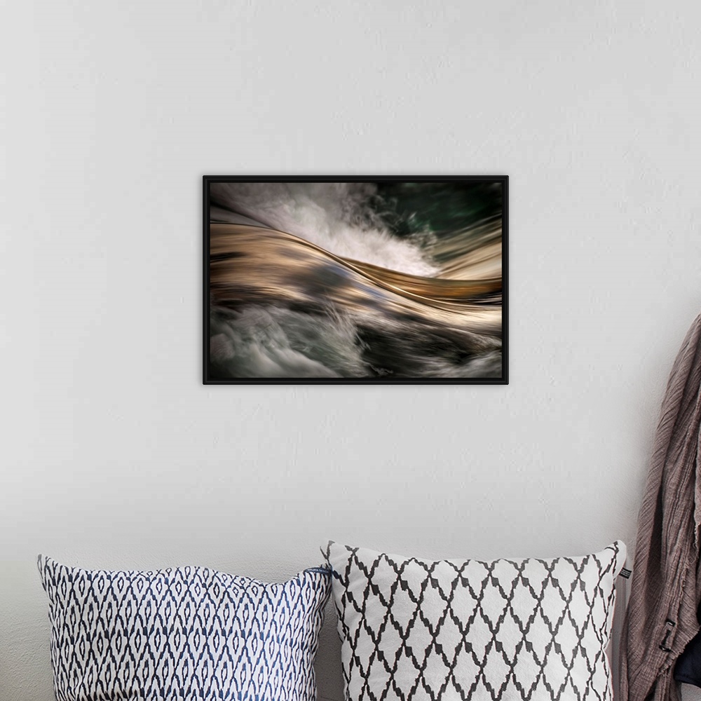 A bohemian room featuring An abstract photograph of a detail from water rapids.