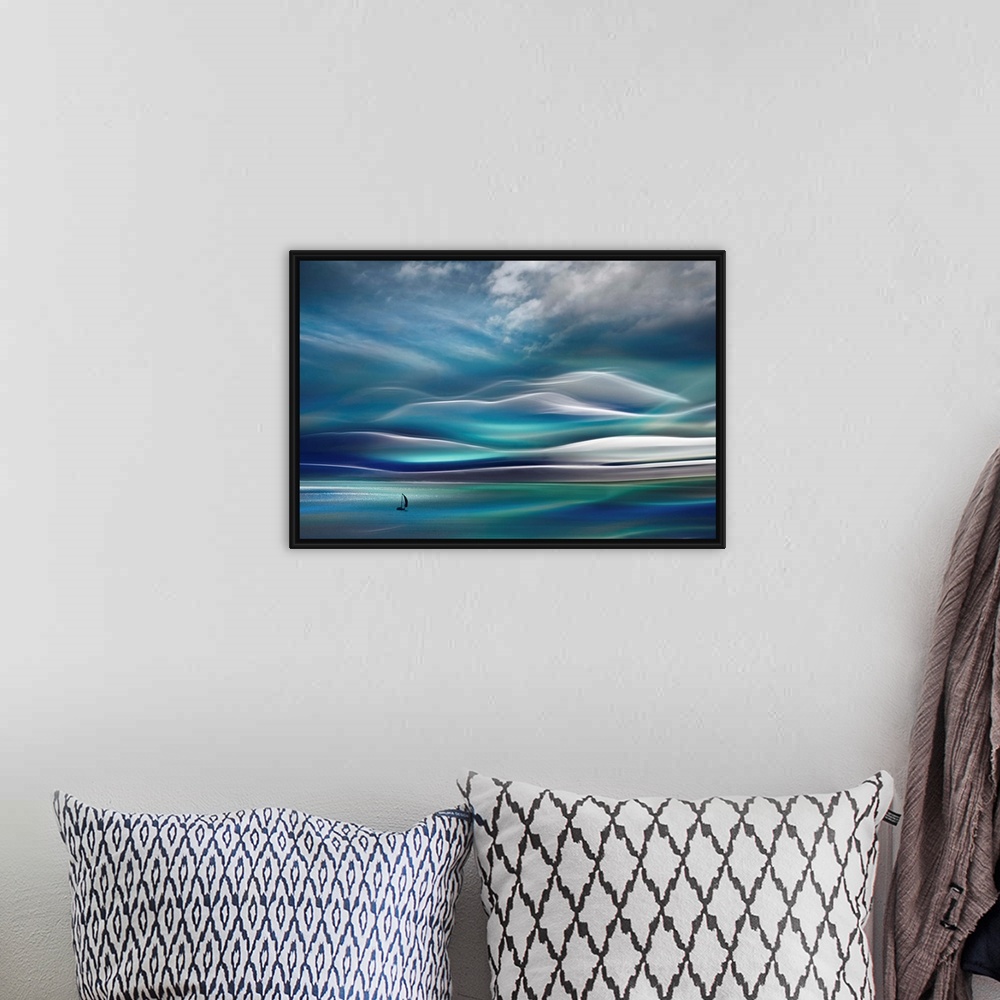 A bohemian room featuring Huge abstract art depicts a lone sailboat traveling across open waters with a mountain in the bac...