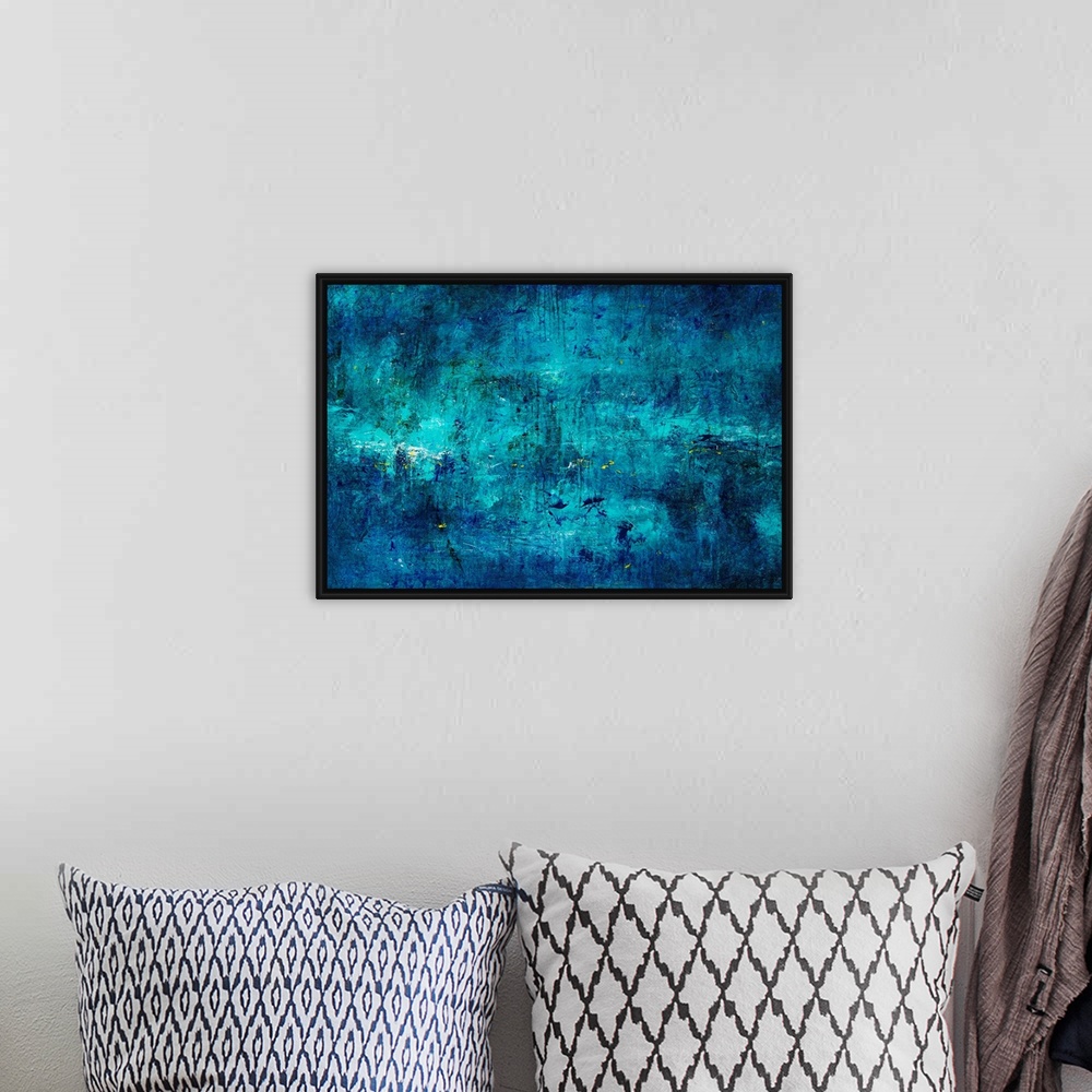 A bohemian room featuring Cool toned abstract painting of deep colors on a grungy background.