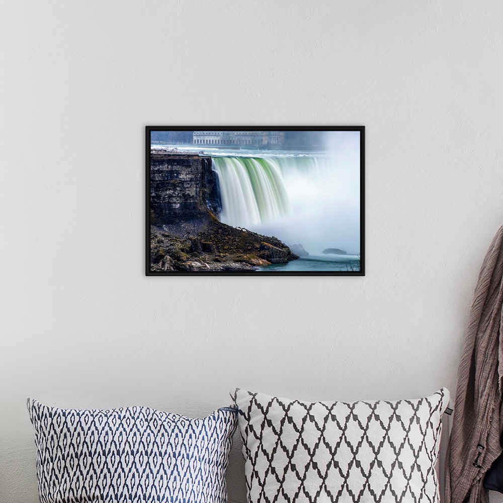 A bohemian room featuring View of Horseshoe Falls at Niagara Falls with former Toronto power generating station in the back...
