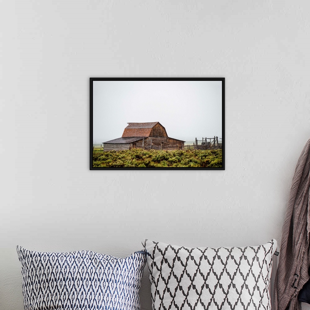 A bohemian room featuring View of the John Moulton Barn with fog rolling in, Grand Teton National Park, Wyoming.