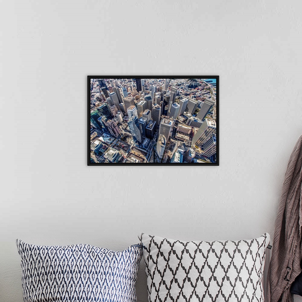 A bohemian room featuring Aerial photography of skyscrapers in downtown San Francisco, California.