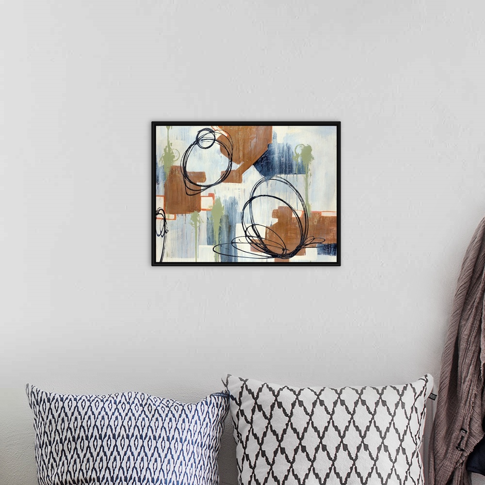 A bohemian room featuring Abstract painting of circles and various other shapes on canvas.