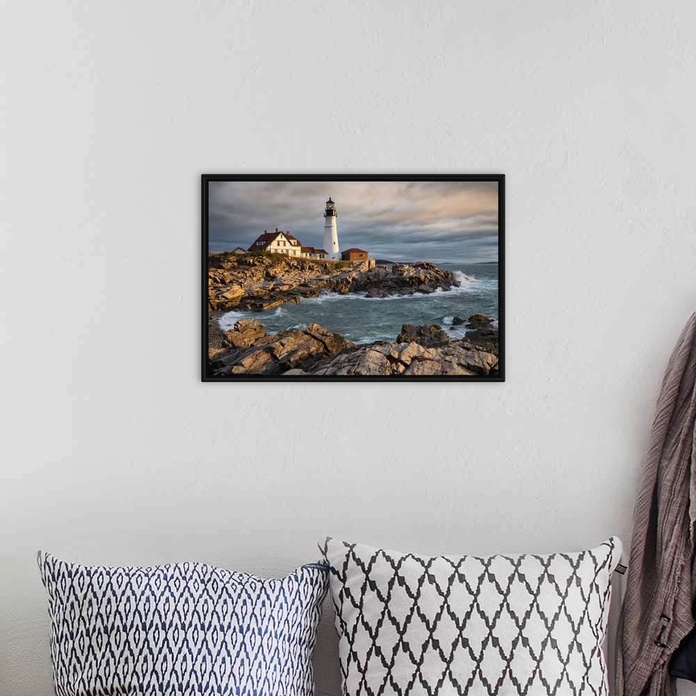 A bohemian room featuring Portland Maine Lighthouse at sunrise.