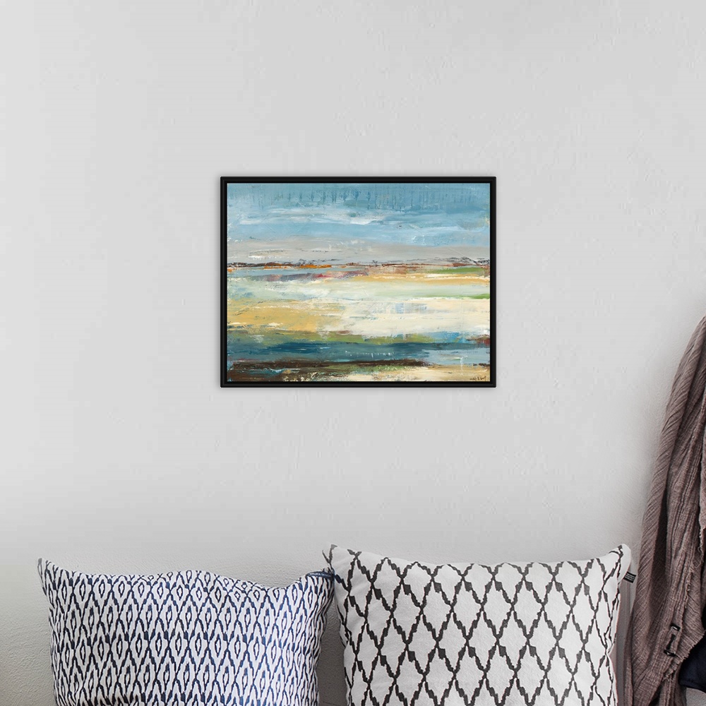 A bohemian room featuring Abstract painting representing a beach landscape with blue, green, orange, brown, yellow, gray, a...