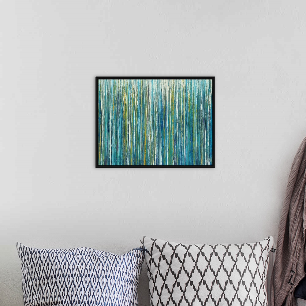 A bohemian room featuring Abstract painting with cool toned vertical lines layered on top and next to one another.