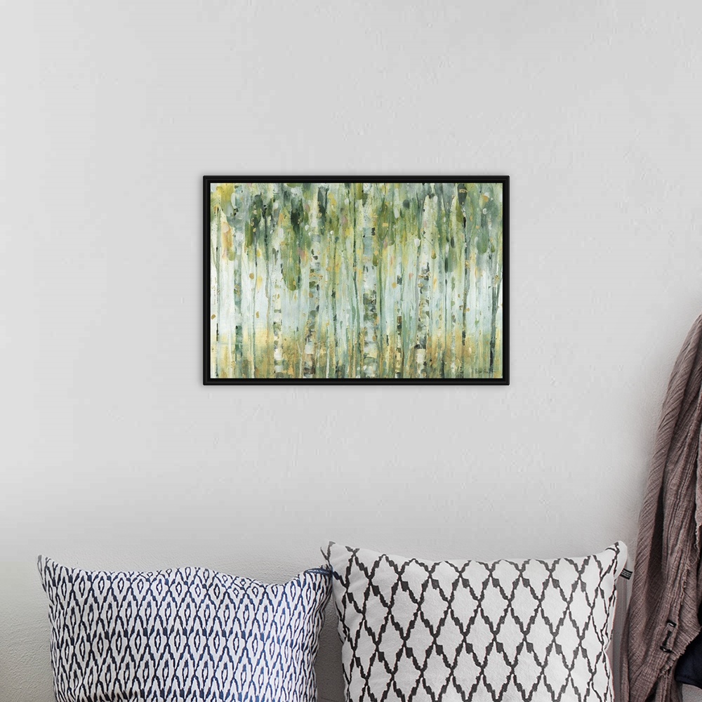 A bohemian room featuring Horizontal contemporary abstract painting with lines of green, blue, yellow, and gold hues runnin...