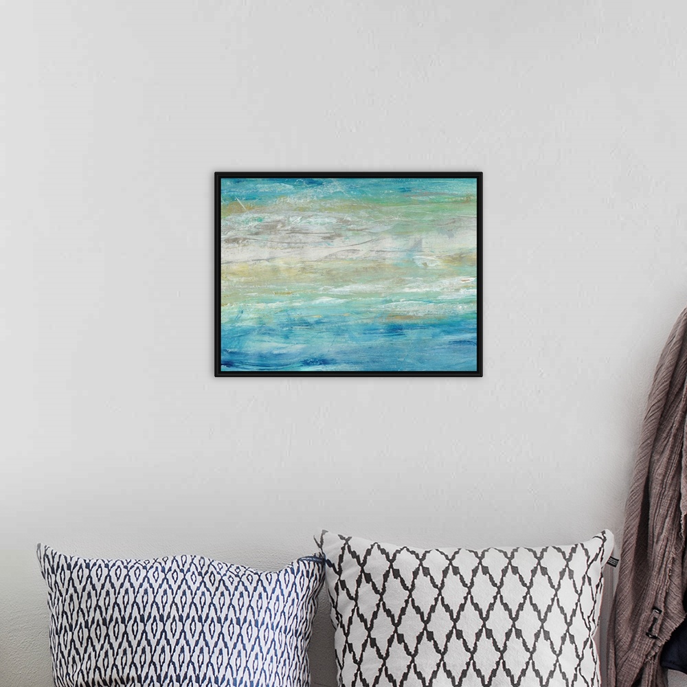 A bohemian room featuring This abstract artwork expresses the turmoil of waves on the ocean by using a ranges of blues and ...