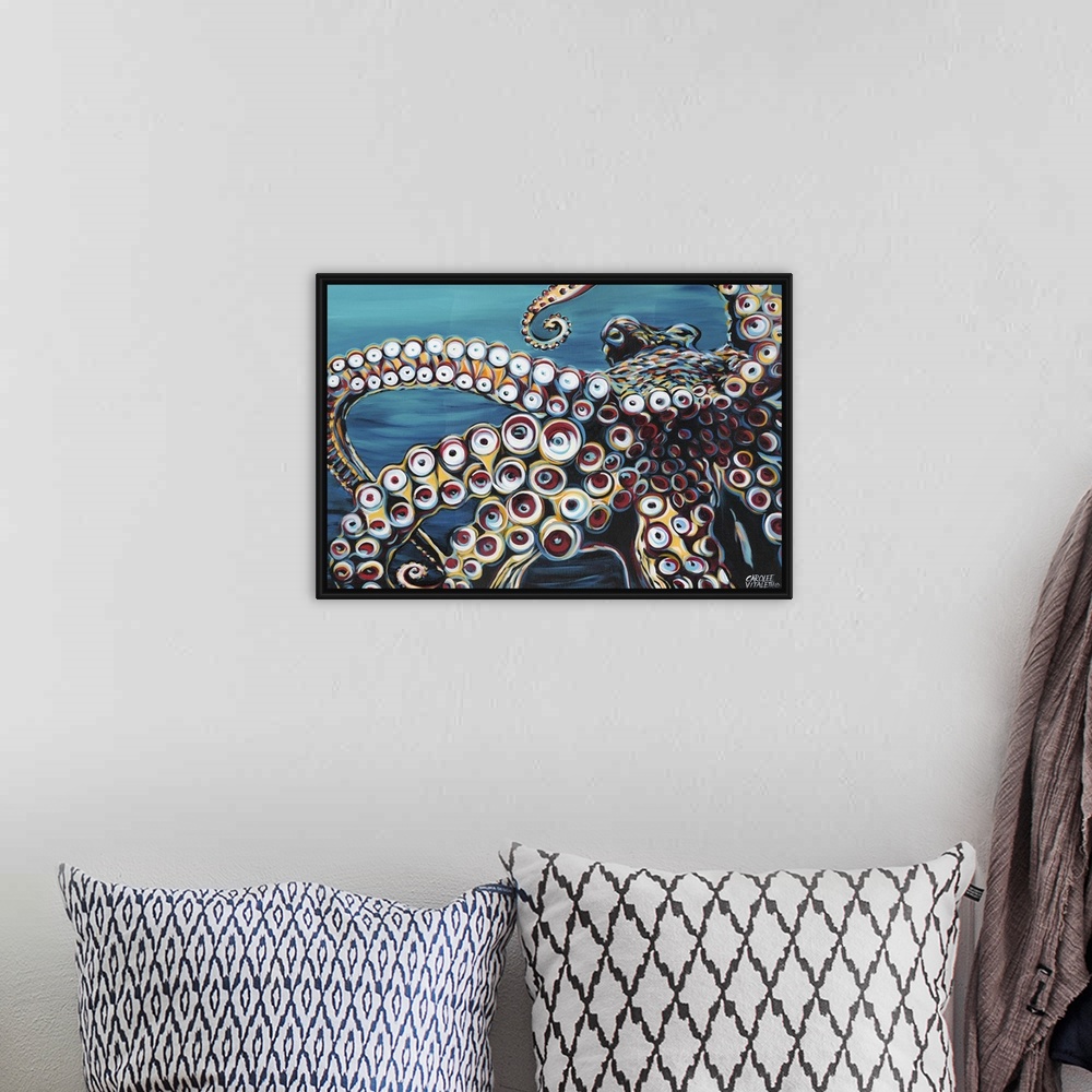 A bohemian room featuring Contemporary painting of an octopus up close, highlighting its circular suctioned tentacles.
