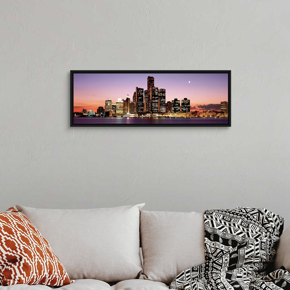A bohemian room featuring Panoramic skyline of downtown Detroit at sundown.