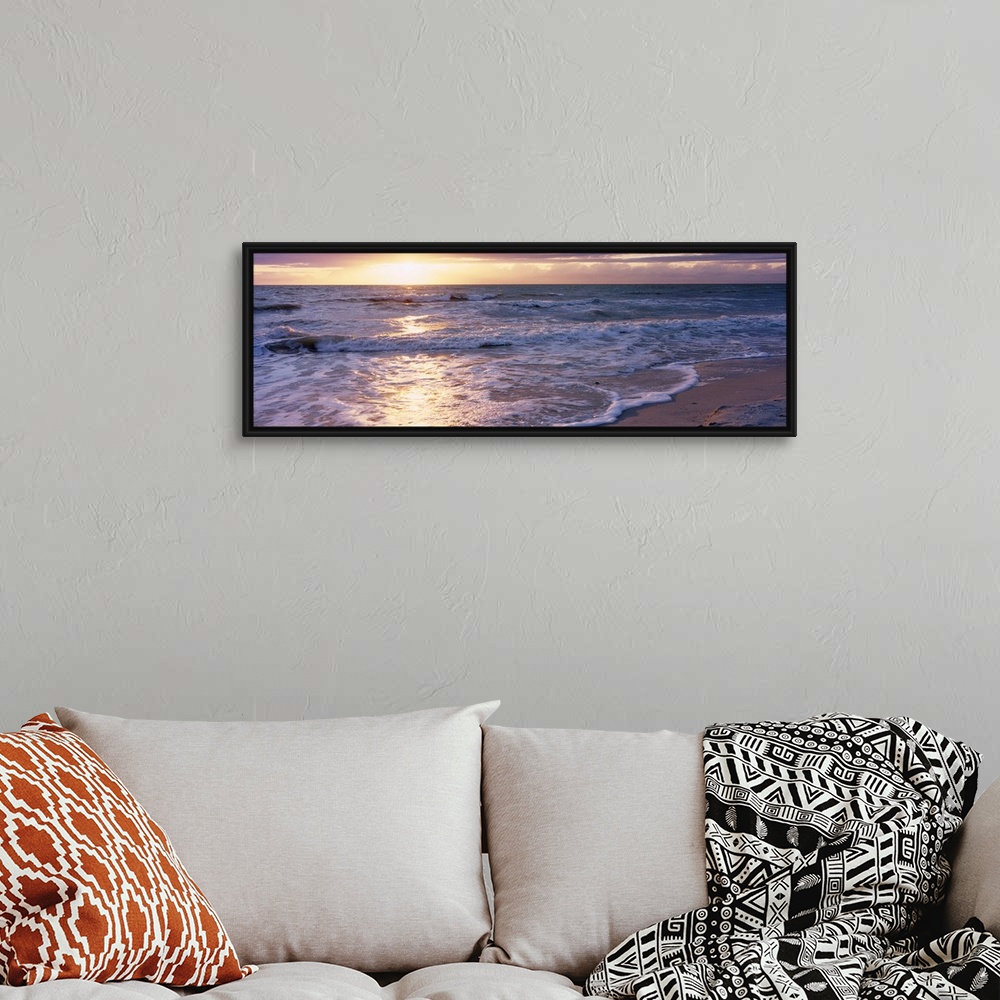 A bohemian room featuring Panoramic photograph of a sunset on a sandy beach in the Gulf of Mexico located within Florida.  ...