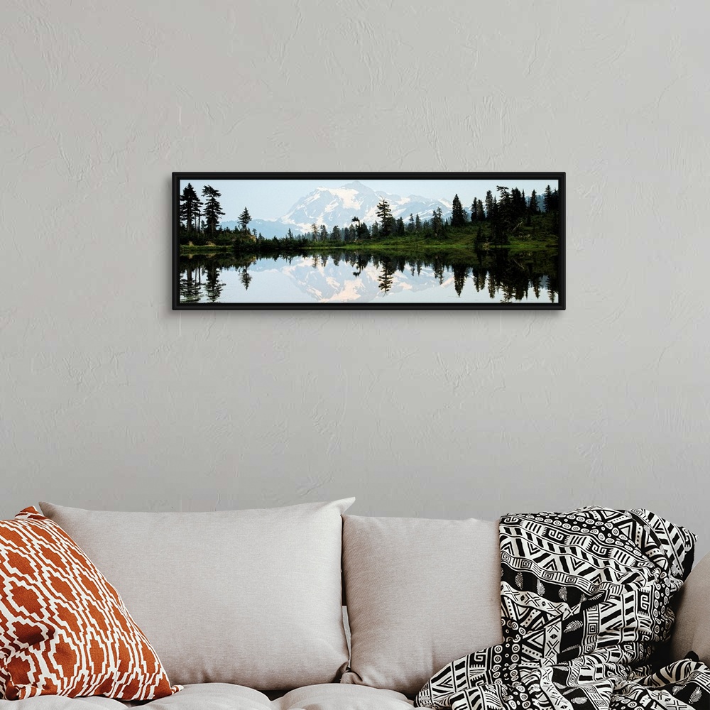 A bohemian room featuring Panoramic photograph of Mt. Shuksan reflecting into Picture Lake around sunset.