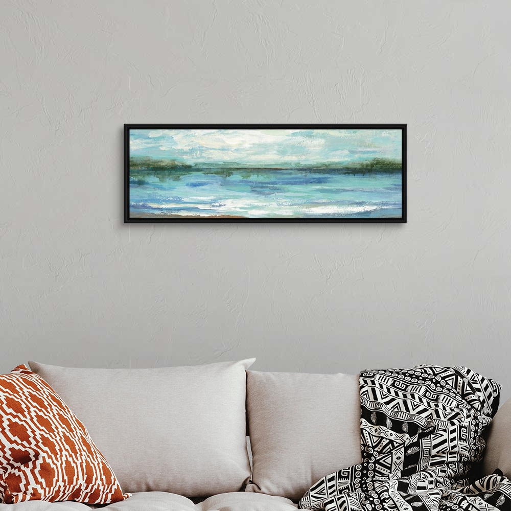 A bohemian room featuring Contemporary landscape painting of a lake scene.