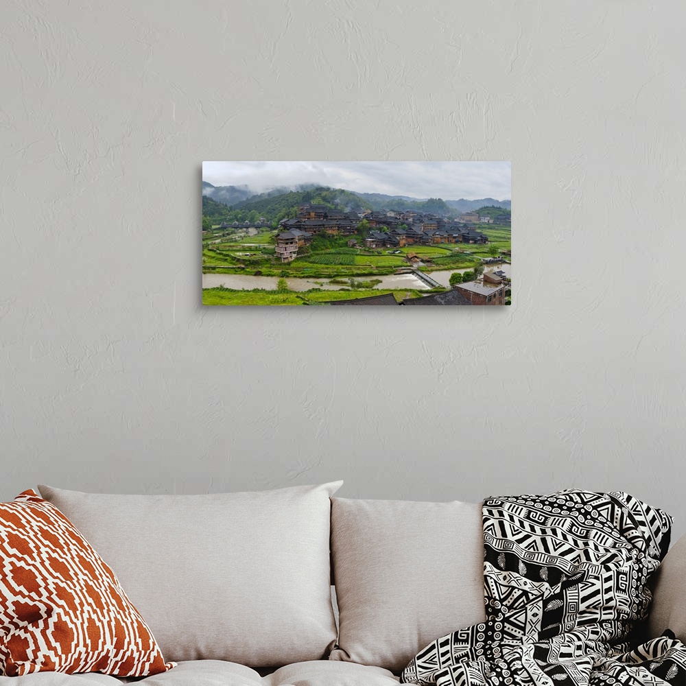 A bohemian room featuring Village with farmland in morning mist, Chengyang, Sanjiang, Guangxi Province, China