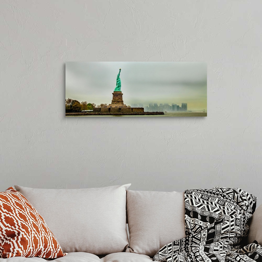 A bohemian room featuring Statue of Liberty with cityscape in the background, Liberty Island, New York City, New York State...
