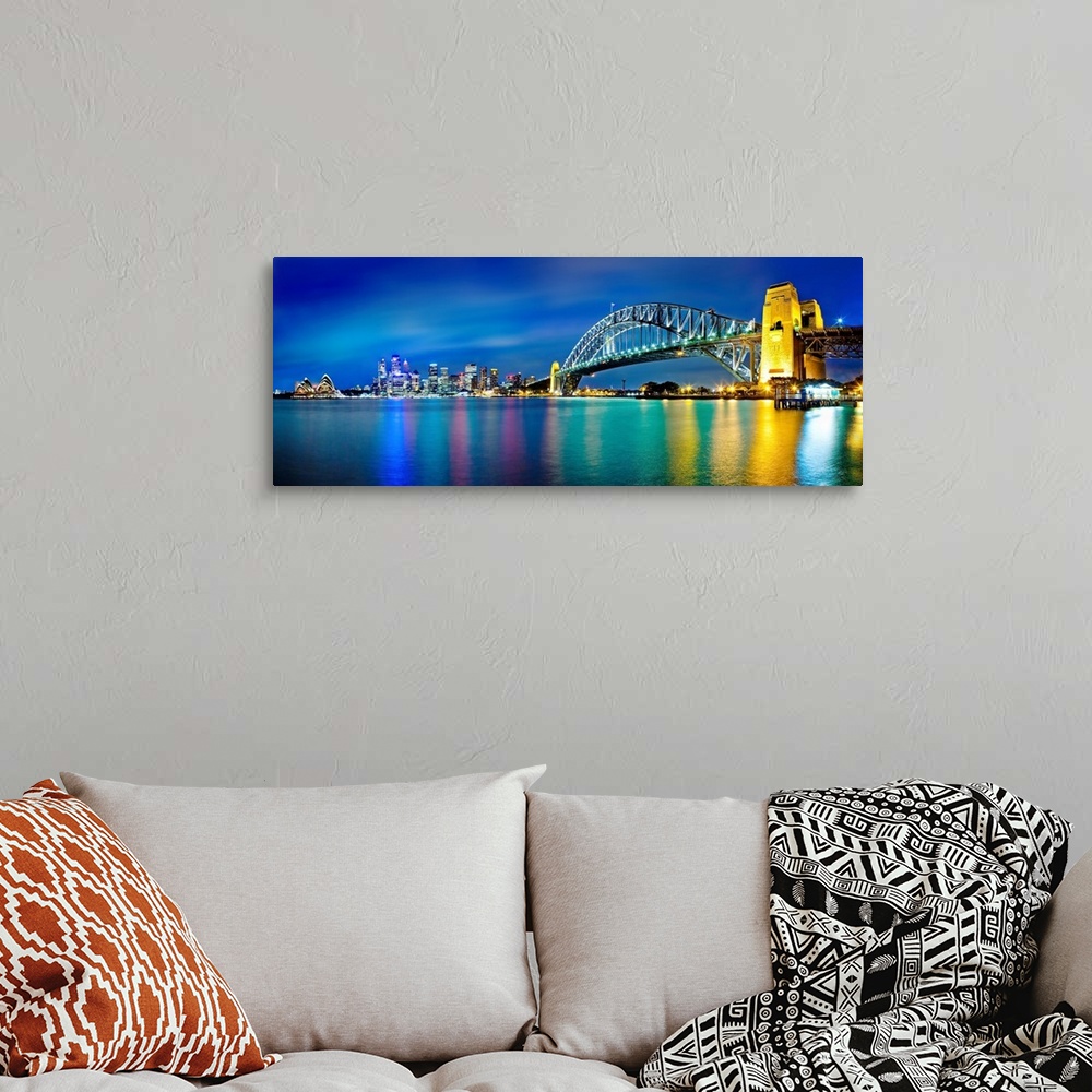 A bohemian room featuring Sydney Harbour Bridge and skylines at night, Sydney, New South Wales, Australia.
