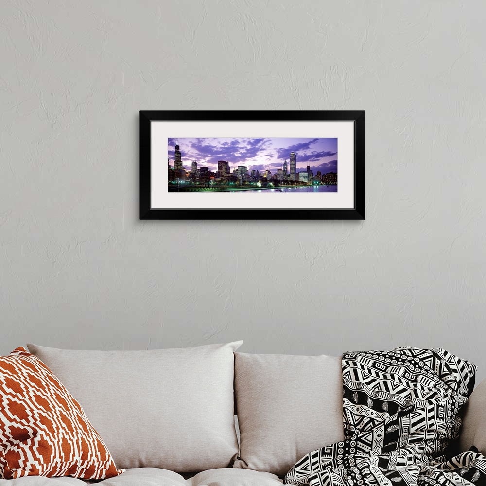 A bohemian room featuring A panoramic photograph taken on Lake Michigan shows the busy skyline filled with skyscrapers in C...