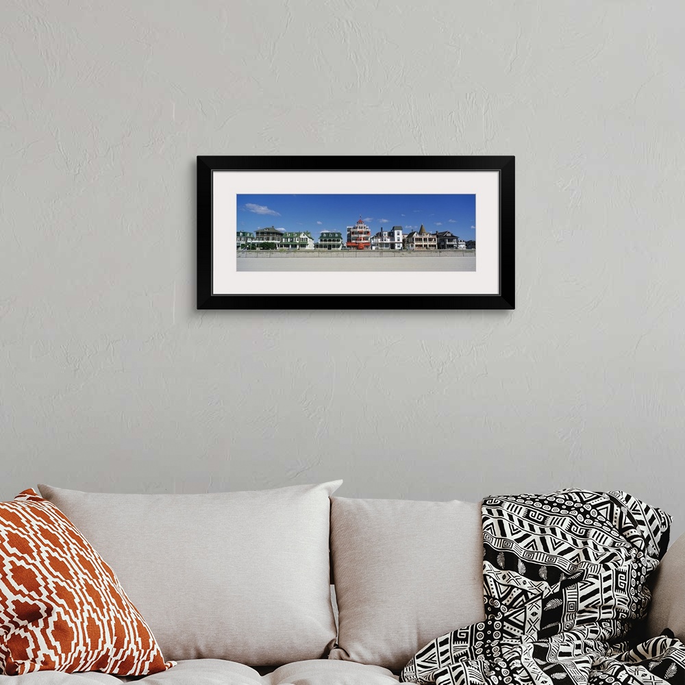 A bohemian room featuring Bright, beach homes on a cloudy day on Main Street Cape in May, New Jersey.