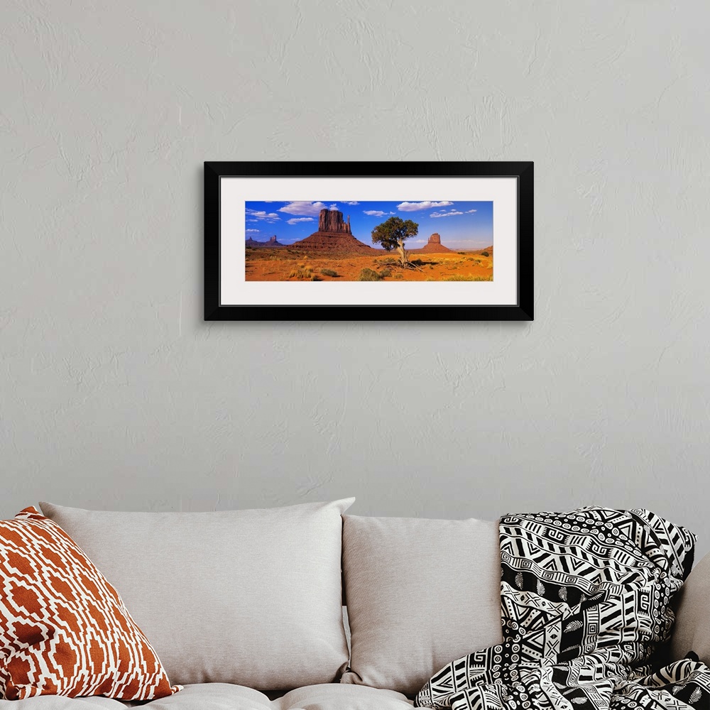 A bohemian room featuring Long horizontal photo on canvas of rock formations in the desert of Arizona.