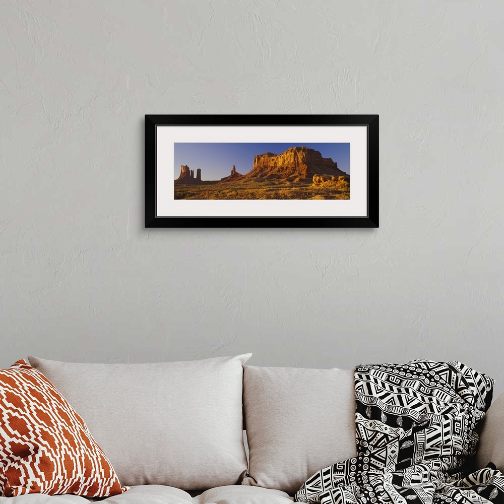 A bohemian room featuring Rock formations on a landscape, Monument Valley, Monument Valley Tribal Park, Utah