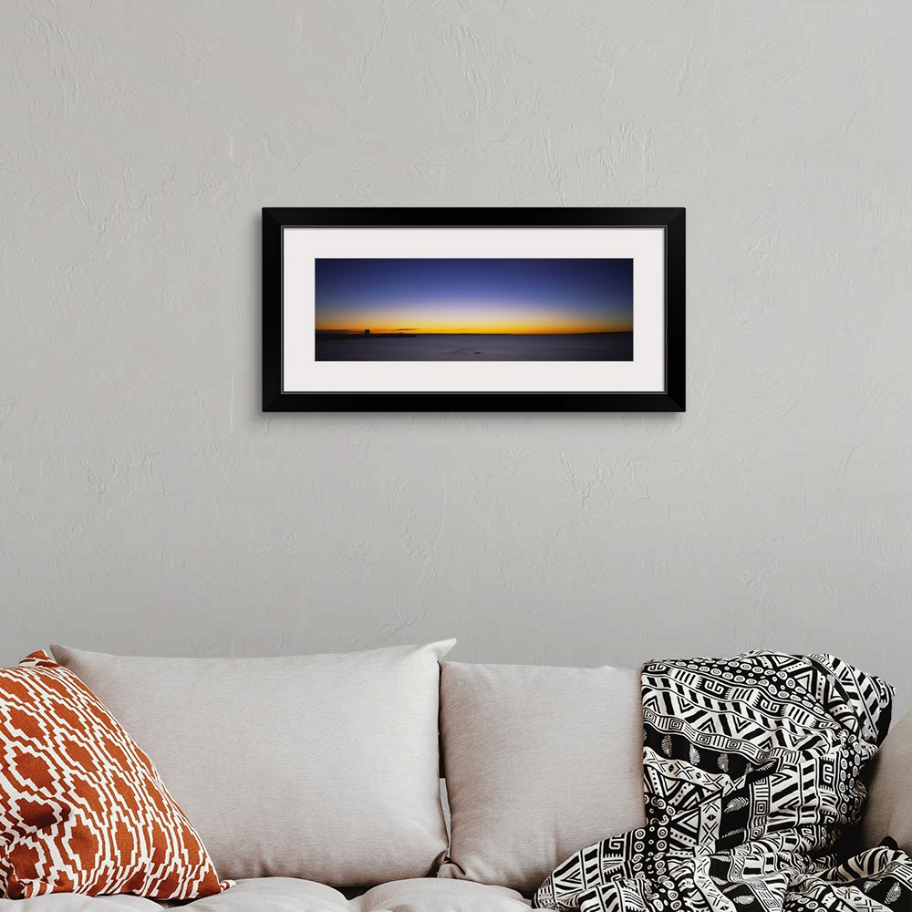 A bohemian room featuring Sunrise over a lake, Lake Huron, Straits of Mackinac, Mackinaw City, Michigan