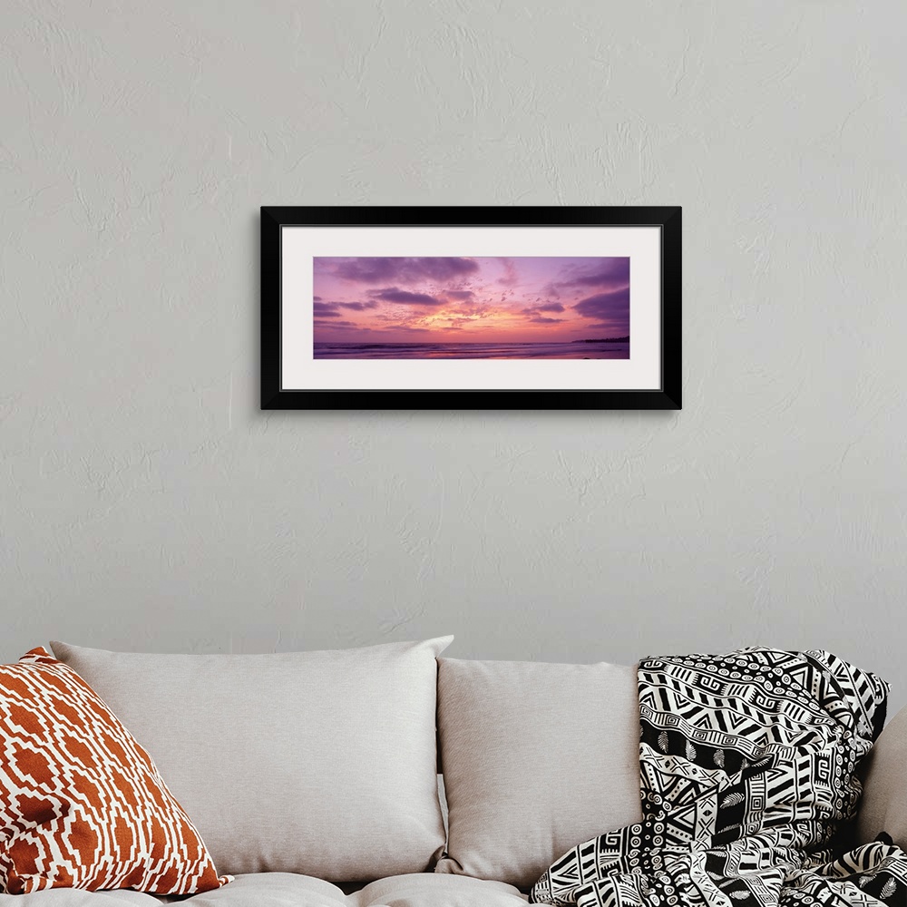 A bohemian room featuring Panoramic photograph of a pastel sunset over the Pacific Beach in San Diego, California, with swi...