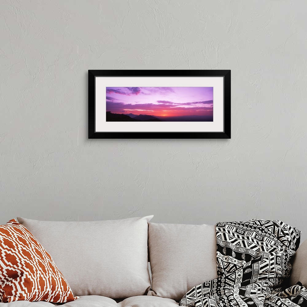 A bohemian room featuring Sunset Sierra Estrella Mountains Phoenix AZ
