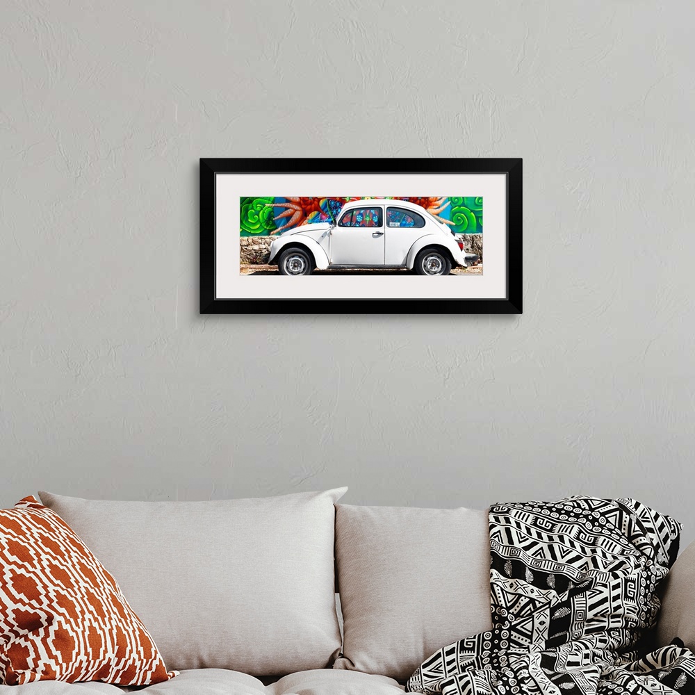 A bohemian room featuring Panoramic photograph of a classic white Volkswagen Beetle parked in front of a colorful wall full...
